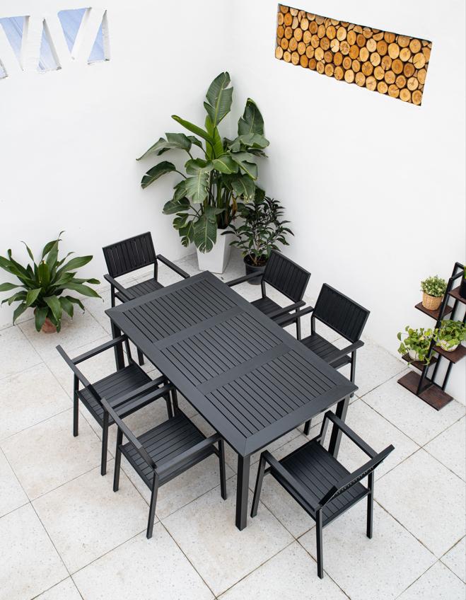 ***OUTDOOR BLACK TABLE AND SIX BLACK CHAIRS